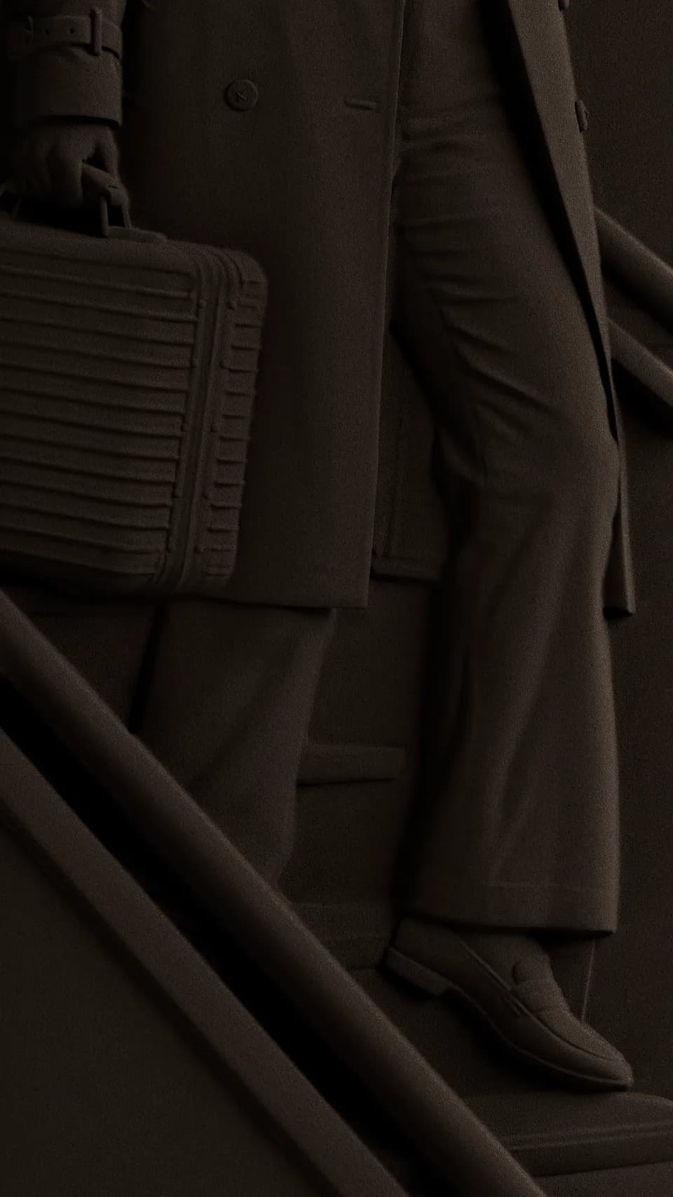 Forum brand identity: dark brown bas relief figure in a long coat and loafers walking down stairs, holding a ribbed briefcase