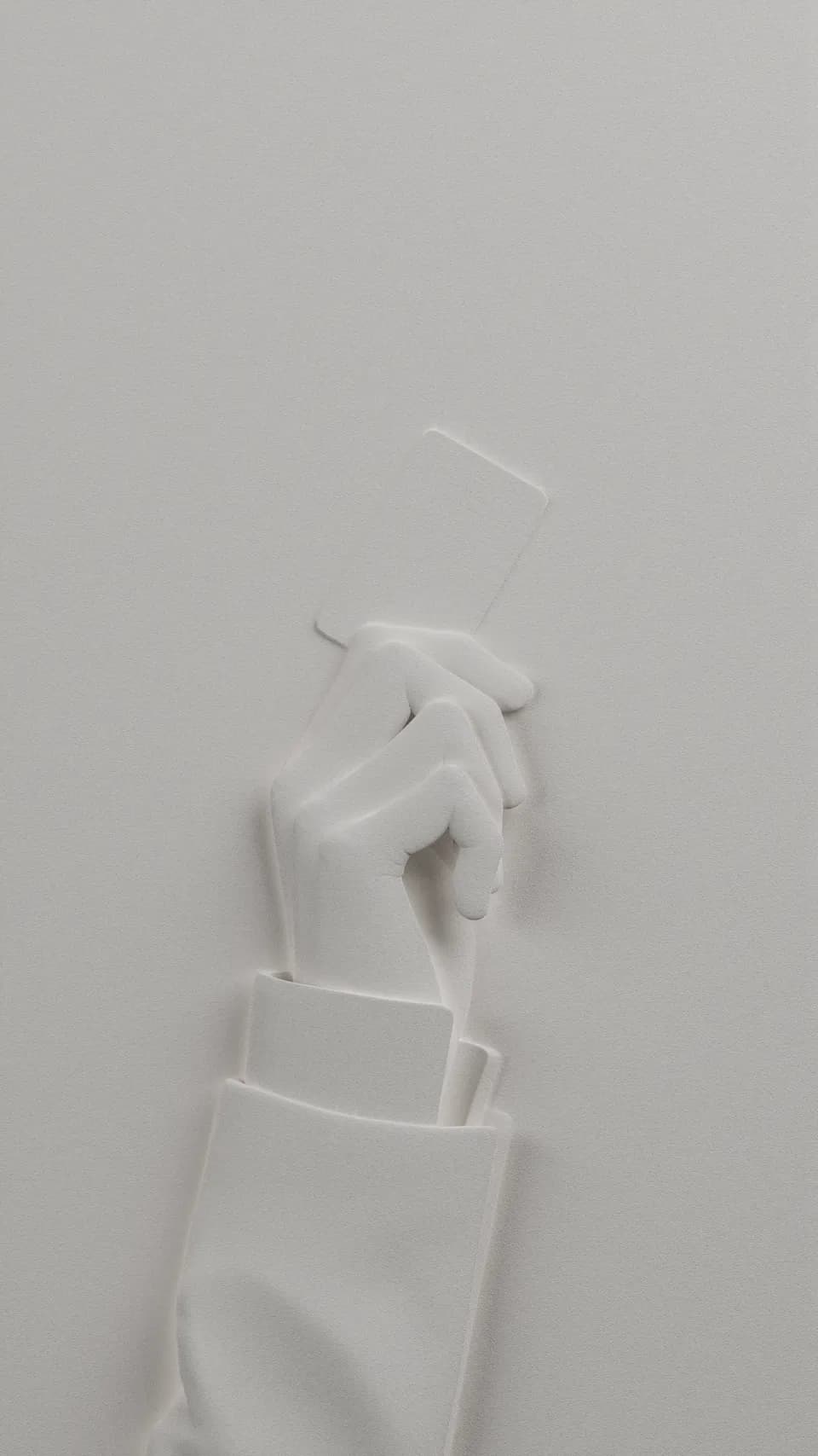 Forum brand identity: white bas relief sculpture of a hand in a suit sleeve holding up a blank card, cream background
