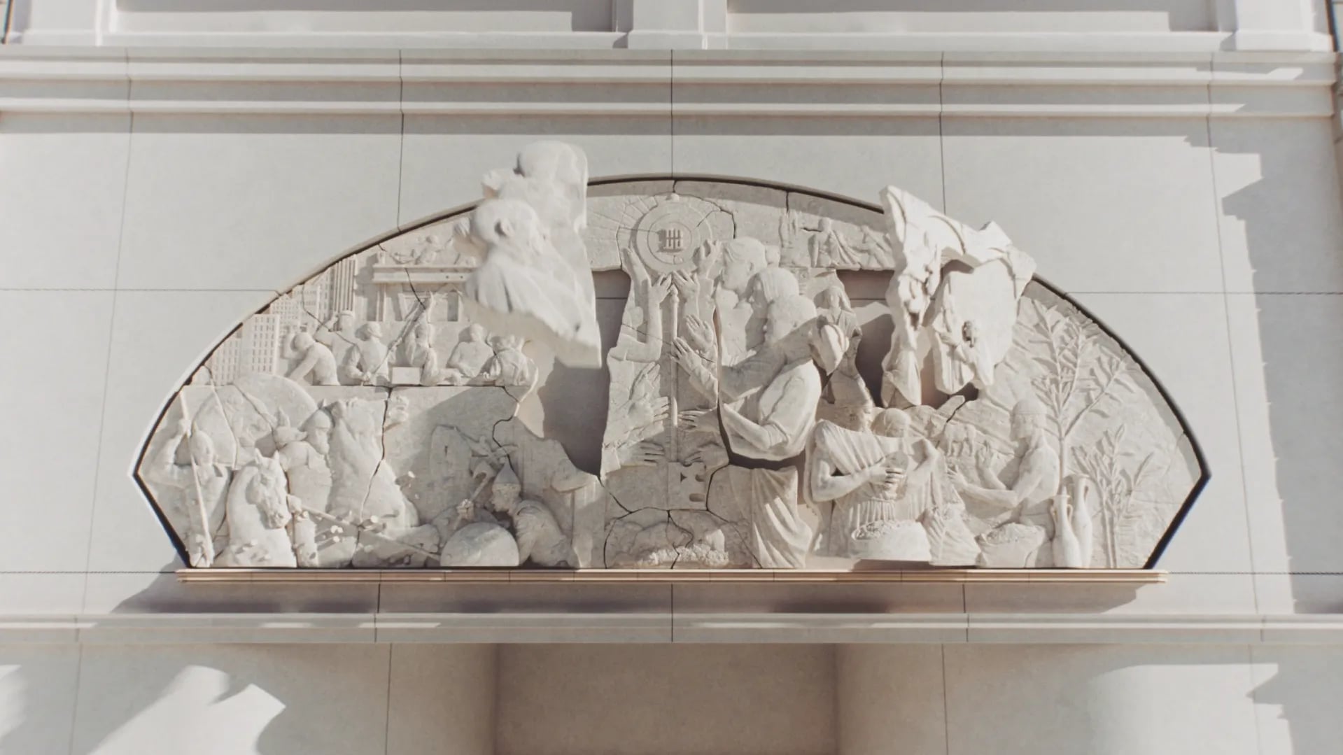 Forum brand identity: cracked stone relief mural of classical figures and horses set above a cream building entrance